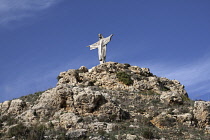 Malta, Gozo, Christ statue on hill near Marsalforn.