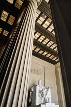USA, Washington DC, National Mall, Lincoln Memorial, Statue of Abraham Lincoln, Angular view between the pillars of the interior.