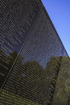 USA, Washington DC, National Mall, Vietnam Veterans Memorial, The Memorial Wall with the names of those killed or missing in action during the Vietnam War.
