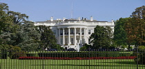 USA, Washington DC, South Portico of the White House with the Stars and Stripes flag flying at half mast.