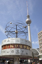 Germany, Berlin, Mitte, Alexanderplatz, the World Clock with Fernsehturm TV Tower behind.