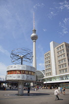 Germany, Berlin, Mitte, Alexanderplatz, the World Clock with Fernsehturm TV Tower behind.