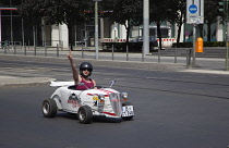 Germany, Berlin, Mitte, Tour of city in minature drag racing cars.