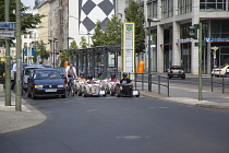 Germany, Berlin, Mitte, Tour of city in minature drag racing cars.