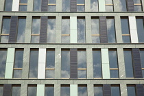 Germany, Berlin, Mitte, Exterior of office building clad with colourful panels including Solar.