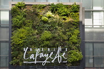 Germany, Berlin, Mitte, Vertical planting on the exterior of Galeries Lafayette on Friedrichstrasse. **Editorial Use Only**