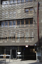 Germany, Berlin, Mitte, Wood clad modern building on Friedrichstrasse.