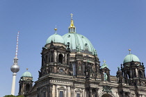 Germany, Berlin, Mitte, Museum Island, Cathedral with Fernsehturm TV Tower behind.