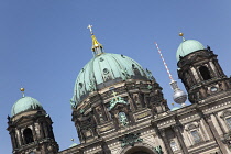 Germany, Berlin, Mitte, Museum Island, Cathedral with Fernsehturm TV Tower behind.