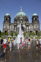 Germany, Berlin, Mitte, Museum Island, Cathedral with Fernsehturm TV Tower behind.