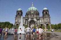 Germany, Berlin, Mitte, Museum Island, Cathedral with Fernsehturm TV Tower behind.