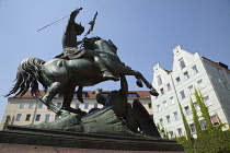 Germany, Berlin, Mitte, Equestrian statue in a square on the banks of the river Spree.