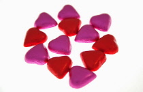 Food, Confections, Chocolate hearts covered in pink and red coloured foil.