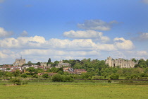 England, West Sussex, Arundel, Castle and Cathedral seen across farmland.