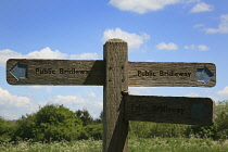 England, West Sussex, Slindon, View of the South Downs with wooden sign for public bridleway.