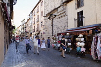 Spain, Castilla La Mancha, Toldeo, Calle Santo Tome with tourists and souvenir shops.