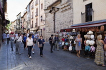 Spain, Castilla La Mancha, Toldeo, Calle Santo Tome with tourists and souvenir shops.