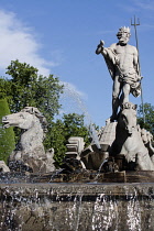 Spain, Madrid, The Fountain of Neptune at the Plaza de Canovas del Castillo.