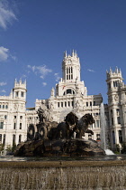 Spain, Madrid, Statue of Cibeles at Plaza de la Cibeles with the Central Post Office in the background.