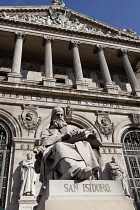 Spain, Madrid, Statue of San Isidoro on the steps of the National Library.