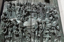 Spain, Madrid, Detail of the carving on the main door to the Cathedral de la Almudena featuring Pope John Paul II.