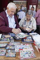 Spain, Madrid, Stamp collectors in the Plaza Mayor.