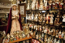 Spain, Madrid, Interior of shop selling religious statues and paraphernalia.