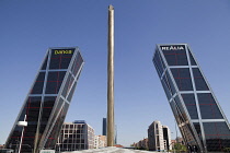 Spain, Madrid, Puerta de Europa with the monument to Calvo Sotelo in the foreground at Plaza de Castilla.