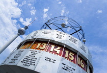 Germany, Berlin, Mitte, The World Clock in Alexanderplatz and the Fernsehturm TV Tower.