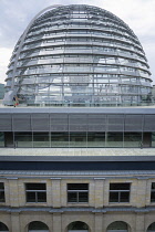 Germany, Berlin, Mitte, Tiergarten, exterior of the glass dome on the top of the Reichstag building designed by architect Norman Foster with a double-helix spiral ramp around the mirrored cone that re...