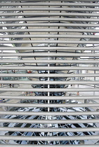 Germany, Berlin, Mitte, Tiergarten, interior of the glass dome seen through metal bars on the top of the Reichstag building designed by architect Norman Foster with a double-helix spiral ramp around t...