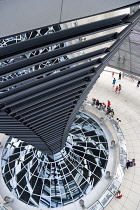 Germany, Berlin, Mitte, Tiergarten, interior of the glass dome on the top of the Reichstag building designed by architect Norman Foster with a double-helix spiral ramp around the mirrored cone that re...