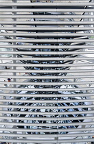 Germany, Berlin, Mitte, Tiergarten, interior of the glass dome seen through metal bars on the top of the Reichstag building designed by architect Norman Foster with a double-helix spiral ramp around t...