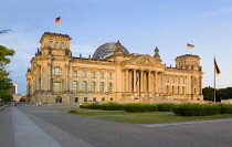 Germany, Berlin, Mitte, The Reichstag building in Tiergarten at sunset.