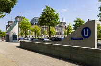 Germany, Berlin, Mitte, The Reichstag building in Tiergarten with an entrance for the Bundestag U-Bahn underground station.