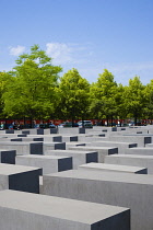 Germany, Berlin, Mitte, Holocaust Memorial designed by US architect Peter Eisenmann with a field of grey slabs symbolizing the millions of Jews killed by the Nazis.