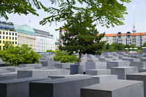Germany, Berlin, Mitte, Holocaust Memorial designed by US architect Peter Eisenmann with a field of grey slabs symbolizing the millions of Jews killed by the Nazis.