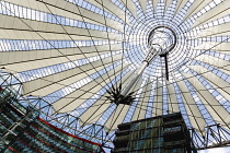 Germany, Berlin, Mitte, Potsdamer Platz, The Sony Centre designed by architect Helmut Jahn with the canopy over the central Forum of restaurants, offices, cinemas, shops and apartments.