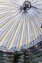 Germany, Berlin, Mitte, Potsdamer Platz, The Sony Centre designed by architect Helmut Jahn with the canopy over the central Forum of restaurants, offices, cinemas, shops and apartments.