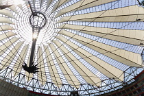 Germany, Berlin, Mitte, Potsdamer Platz, The Sony Centre designed by architect Helmut Jahn with the canopy over the central Forum of restaurants, offices, cinemas, shops and apartments.