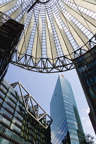 Germany, Berlin, Mitte, Potsdamer Platz, The Sony Centre designed by architect Helmut Jahn with the canopy over the central Forum of restaurants, offices, cinemas, shops and apartments.