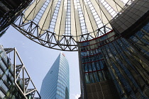 Germany, Berlin, Mitte, Potsdamer Platz, The Sony Centre designed by architect Helmut Jahn with the canopy over the central Forum of restaurants, offices, cinemas, shops and apartments.