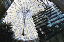 Germany, Berlin, Mitte, Potsdamer Platz, The Sony Centre designed by architect Helmut Jahn with the canopy over the central Forum of restaurants, offices, cinemas, shops and apartments.