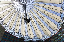 Germany, Berlin, Mitte, Potsdamer Platz, The Sony Centre designed by architect Helmut Jahn with the canopy over the central Forum of restaurants, offices, cinemas, shops and apartments.