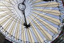 Germany, Berlin, Mitte, Potsdamer Platz, The Sony Centre designed by architect Helmut Jahn with the canopy over the central Forum of restaurants, offices, cinemas, shops and apartments.