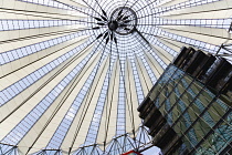 Germany, Berlin, Mitte, Potsdamer Platz, The Sony Centre designed by architect Helmut Jahn with the canopy over the central Forum of restaurants, offices, cinemas, shops and apartments.