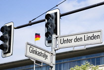 Germany, Berlin, Mitte, Traffic lights and roadsign for Unter den Linden.
