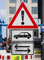 Germany, Berlin, Mitte, Traffic control signs on Unter den Linden during construction work.