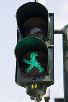 Germany, Berlin, Mitte, a green Ampelmann, or Ampel Man, the symbol for go used on the former East German pedestrian traffic lights created by Karl Peglau and retained after protests about it's scrapp...