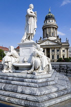 Germany, Berlin, Mitte, The Gendarmenmarkt square with a statue of the German poet and philosopher Friedrich Schiller and The French Cathedral, Franzosischer Dom.